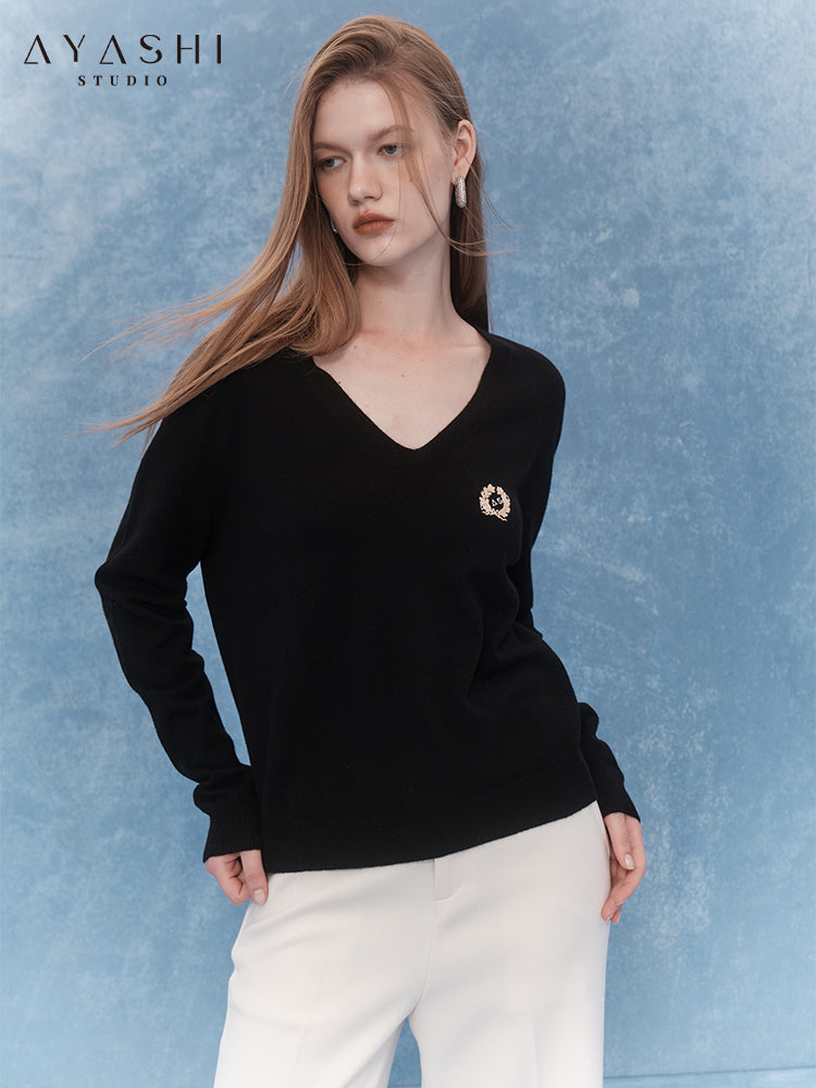 Black V-neck sweater